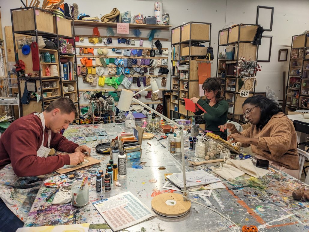 Crafters working on their projects.