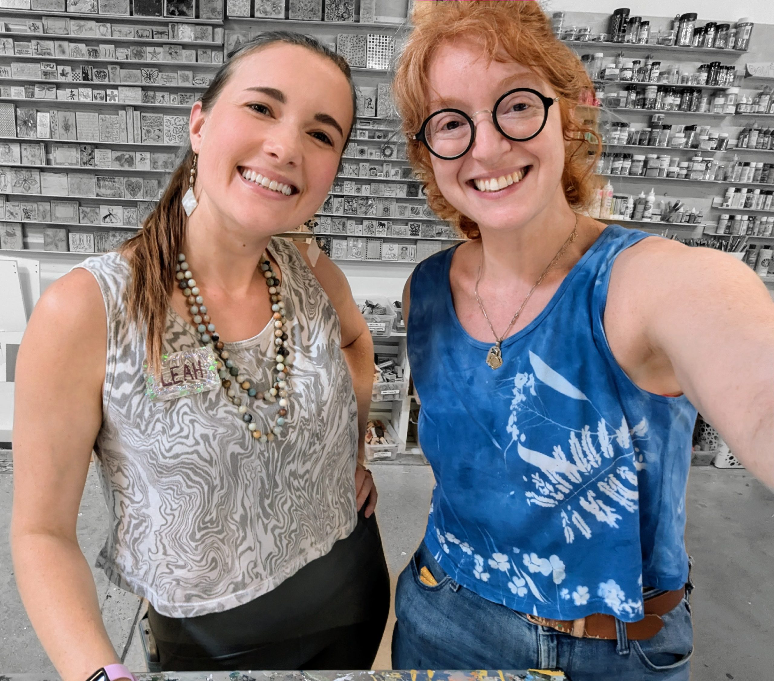 Leah in her marbled shirt (suminagashi) and Eli in her solar printed shirt